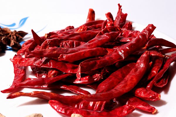 Red chilli powder in a white bowl