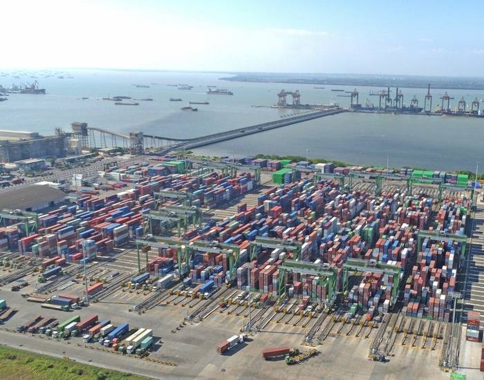 Aerial view of a busy shipping port with export containers